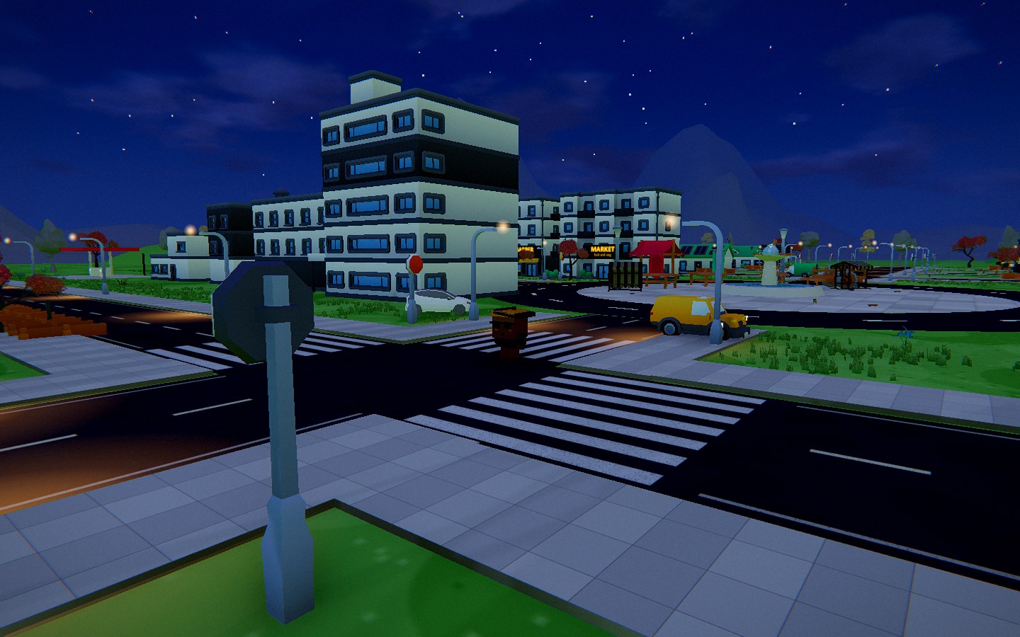 The avenue at night, shop signs lit